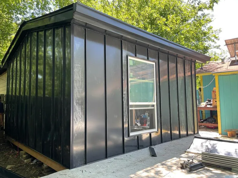 Black standing seam metal wall panels for Metal Roof Installation in Purcell